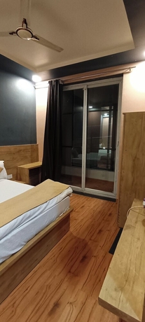 Imagen de la habitación del Hotel Devi Residency. Foto 15