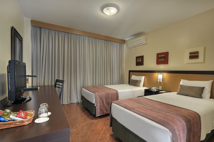 Imagen de la habitación del Hotel Deville Business Maringá. Foto 7