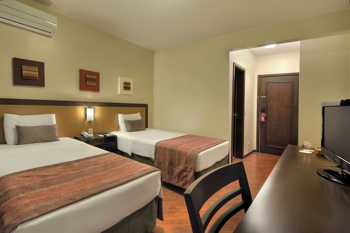 Imagen de la habitación del Hotel Deville Business Maringá. Foto 8