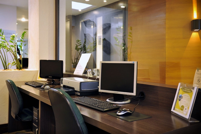 Imagen de los interiores del Hotel Deville Curitiba Batel. Foto 12