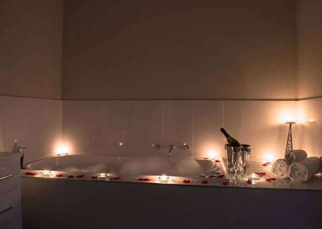 Imagen de la habitación del Hotel De'vine Escape. Foto 22