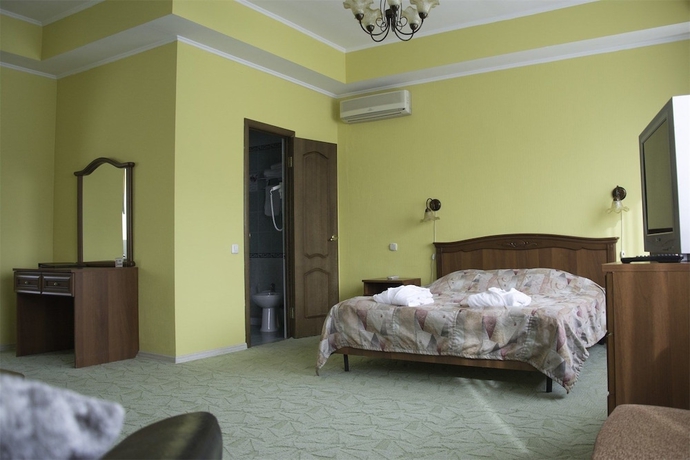 Imagen de la habitación del Hotel Devon Resort and Spa. Foto 17