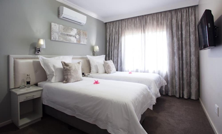 Imagen de la habitación del Hotel Devonvale Golf and Wine Estate. Foto 9