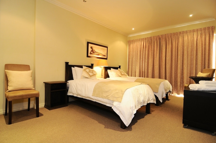 Imagen de la habitación del Hotel Devonvale Golf and Wine Estate. Foto 17