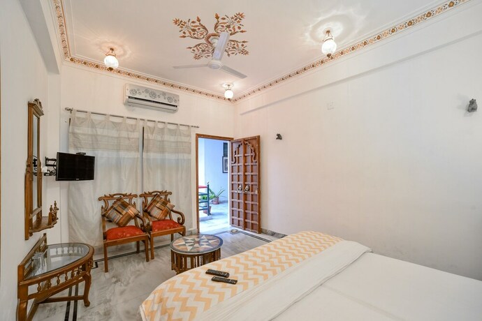 Imagen de la habitación del Hotel Devraj Niwas On Lake Pichola Udaipur. Foto 14