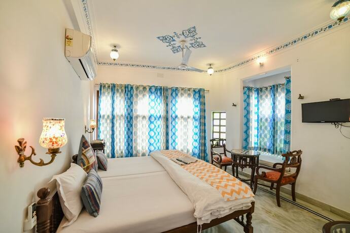 Imagen de la habitación del Hotel Devraj Niwas On Lake Pichola Udaipur. Foto 15