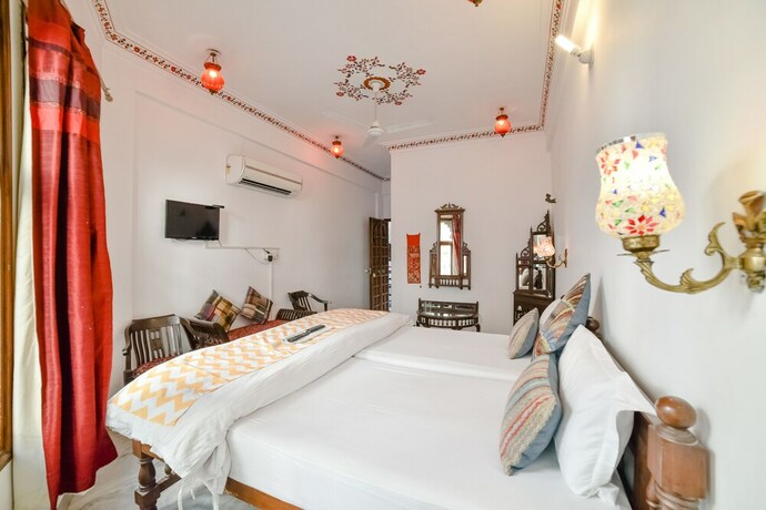 Imagen de la habitación del Hotel Devraj Niwas On Lake Pichola Udaipur. Foto 17