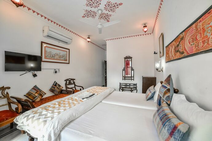Imagen de la habitación del Hotel Devraj Niwas On Lake Pichola Udaipur. Foto 18