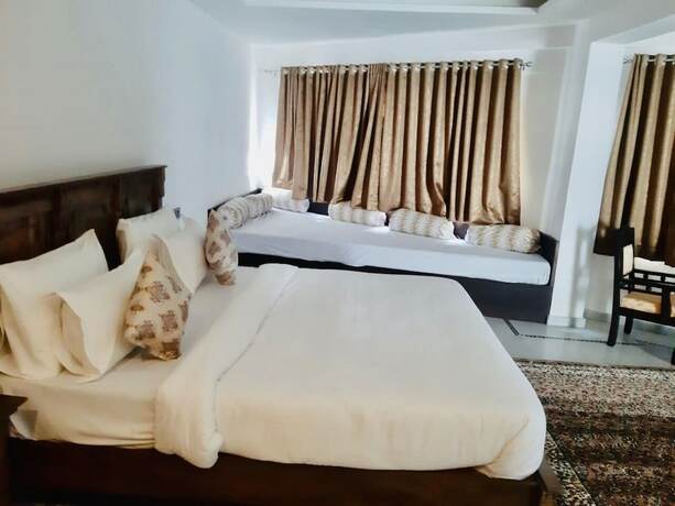 Imagen de la habitación del Hotel Devraj Niwas On Lake Pichola Udaipur. Foto 19
