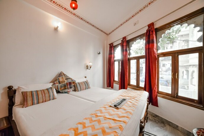 Imagen de la habitación del Hotel Devraj Niwas On Lake Pichola Udaipur. Foto 21