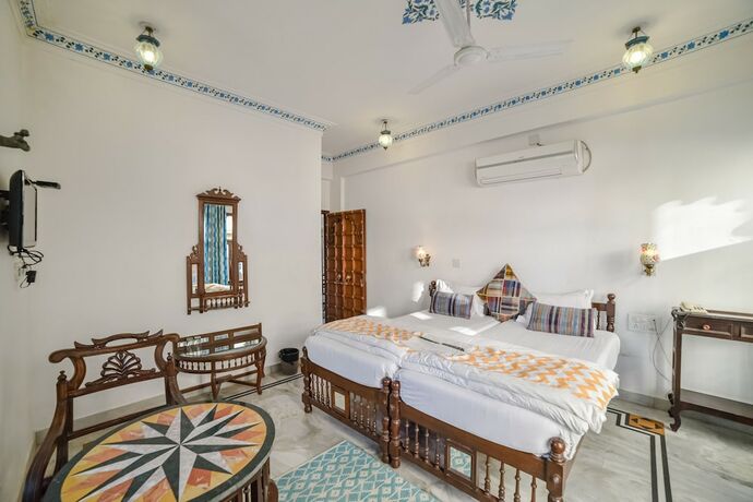 Imagen de la habitación del Hotel Devraj Niwas On Lake Pichola Udaipur. Foto 25