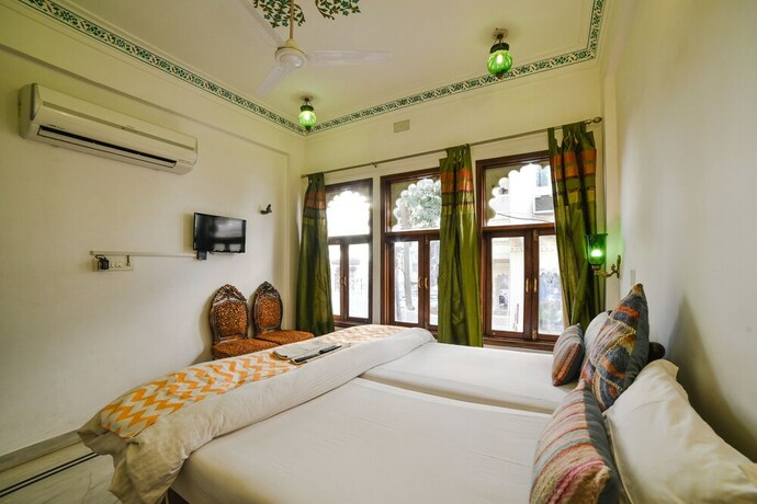 Imagen de la habitación del Hotel Devraj Niwas On Lake Pichola Udaipur. Foto 26