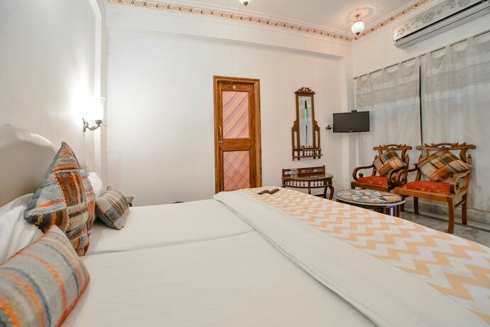 Imagen de la habitación del Hotel Devraj Niwas On Lake Pichola Udaipur. Foto 27