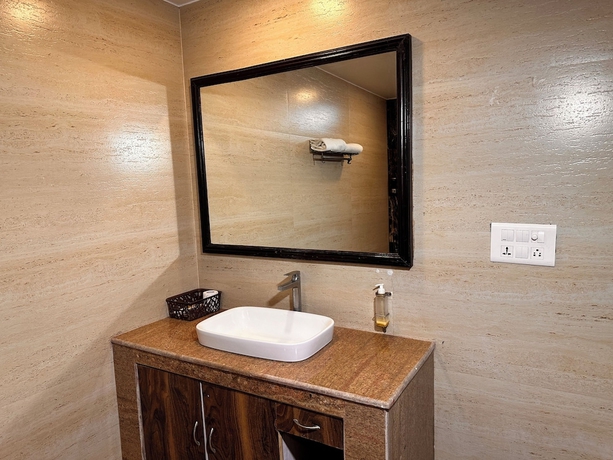 Imagen de la habitación del Hotel Devrath By Big Bite Resort. Foto 10