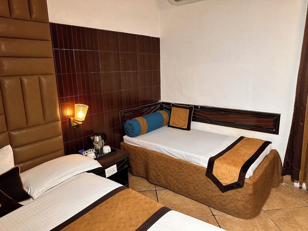 Imagen de la habitación del Hotel Devrath By Big Bite Resort. Foto 11