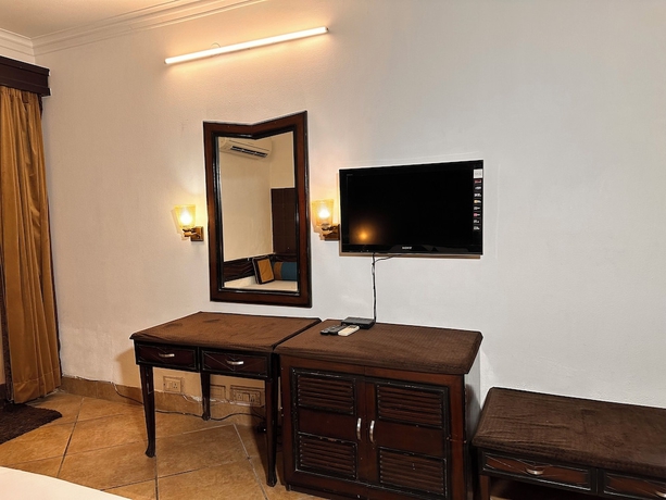 Imagen de la habitación del Hotel Devrath By Big Bite Resort. Foto 13