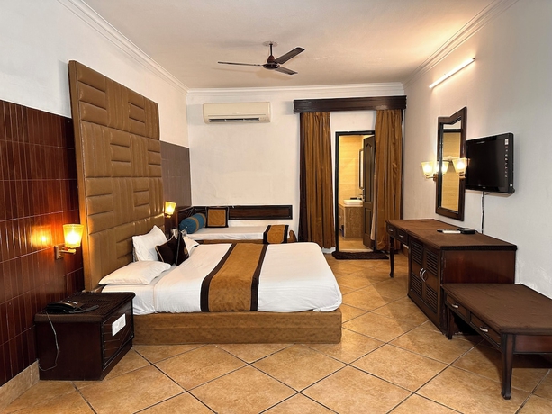 Imagen de la habitación del Hotel Devrath By Big Bite Resort. Foto 16