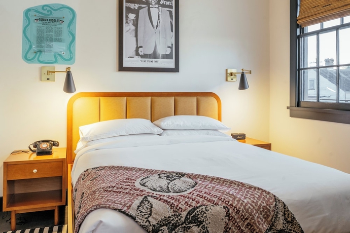 Imagen de la habitación del Hotel Dew Drop Inn. Foto 9