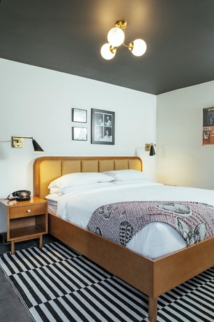 Imagen de la habitación del Hotel Dew Drop Inn. Foto 11