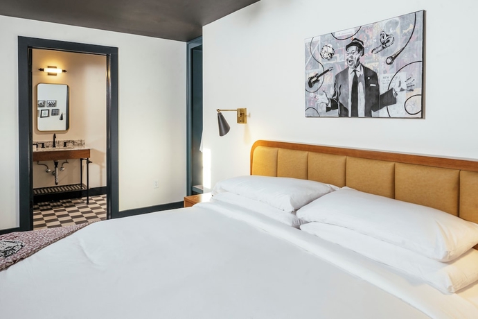 Imagen de la habitación del Hotel Dew Drop Inn. Foto 15