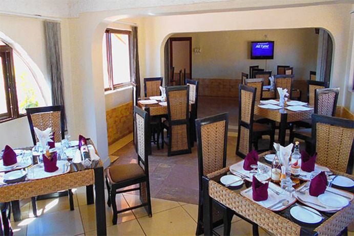 Imagen del bar/restaurante del Hotel DewChurch Drive. Foto 4