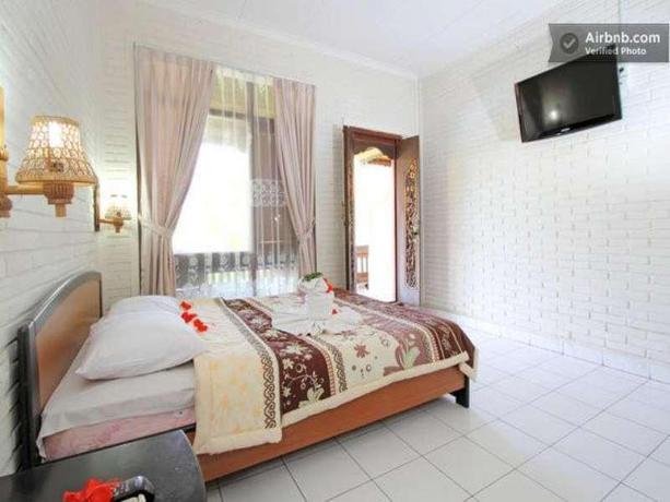 Imagen de la habitación del Hotel Dewa Bharata Hotel Ubud. Foto 9