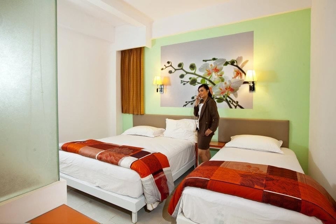 Imagen de la habitación del Hotel Dewarna Zainul Arifin Malang. Foto 6