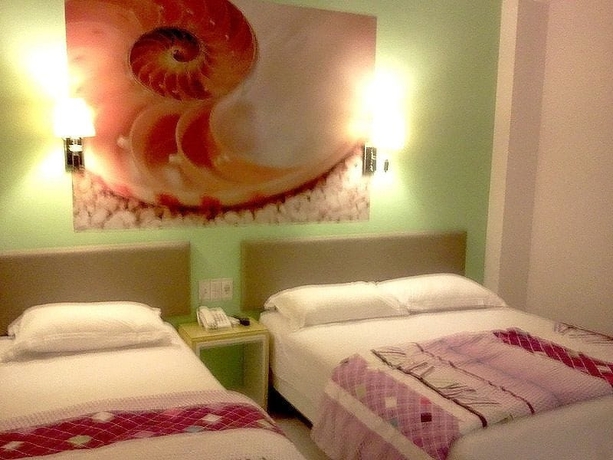 Imagen de la habitación del Hotel Dewarna Zainul Arifin Malang. Foto 7