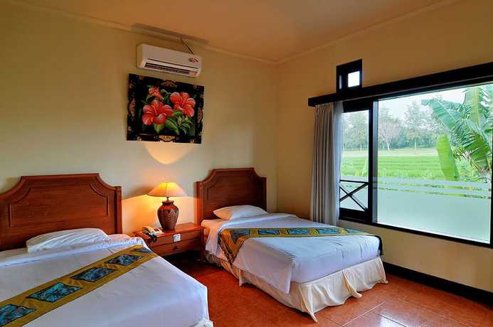 Imagen de la habitación del Hotel Dewi Sinta and Restaurant. Foto 12