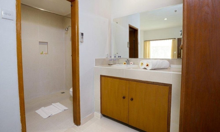 Imagen de la habitación del Hotel Dewi Sri. Foto 7