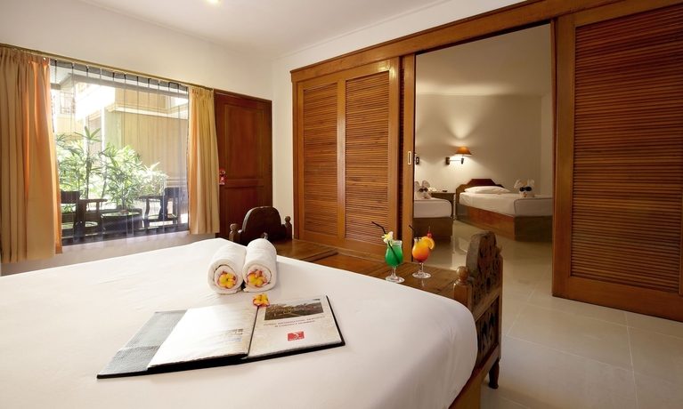 Imagen de la habitación del Hotel Dewi Sri. Foto 12