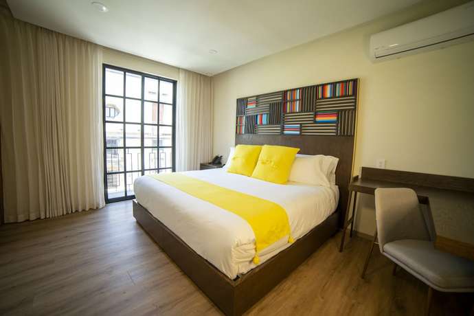 Imagen de la habitación del Hotel Dex Tlaquepaque. Foto 10