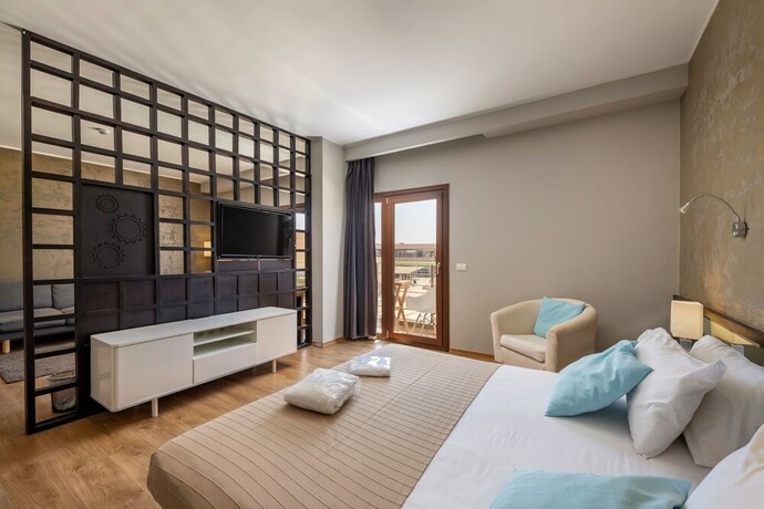 Imagen de la habitación del Hotel Dhara Residence E2 Lodge. Foto 14