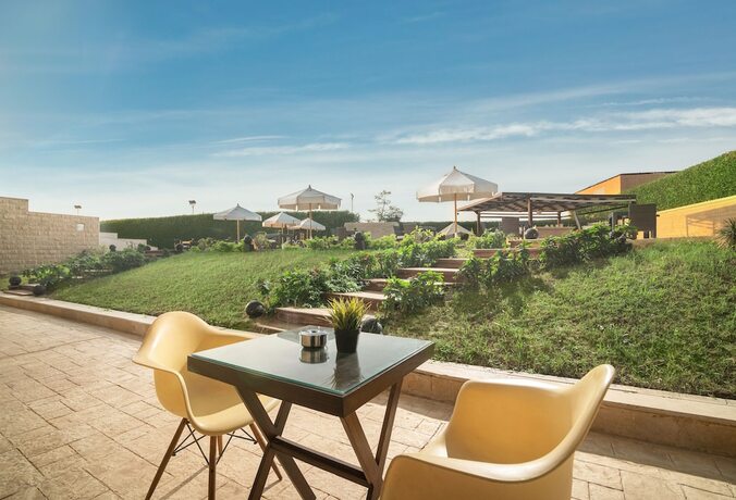 Imagen de la habitación del Hotel Dhara Residence E2 Lodge. Foto 15