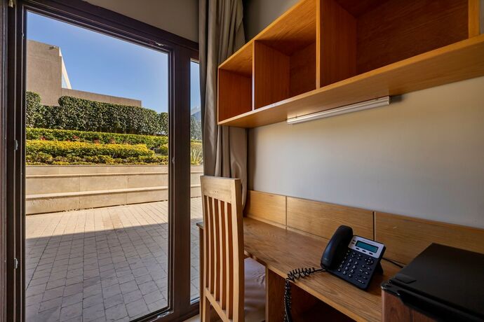 Imagen de la habitación del Hotel Dhara Residence E2 Lodge. Foto 17