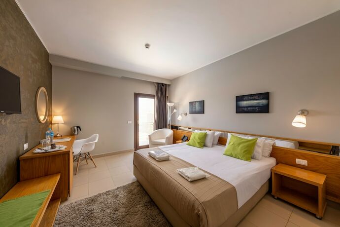 Imagen de la habitación del Hotel Dhara Residence E2 Lodge. Foto 21