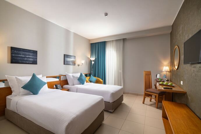 Imagen de la habitación del Hotel Dhara Residence E2 Lodge. Foto 24