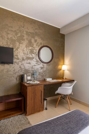 Imagen de la habitación del Hotel Dhara Residence E2 Lodge. Foto 29