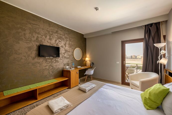 Imagen de la habitación del Hotel Dhara Residence E2 Lodge. Foto 30