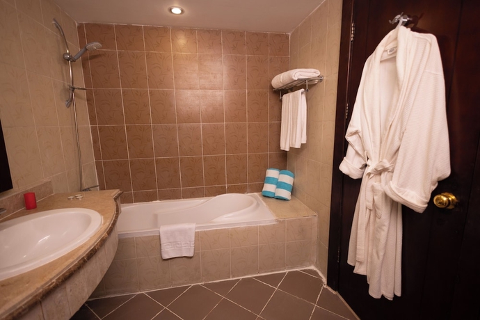Imagen de la habitación del Hotel Dhara Residence Grand Waha. Foto 5
