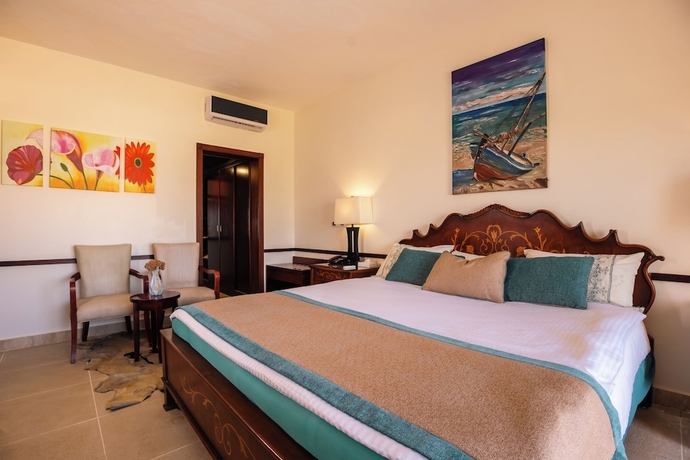 Imagen de la habitación del Hotel Dhara Residence Grand Waha. Foto 7