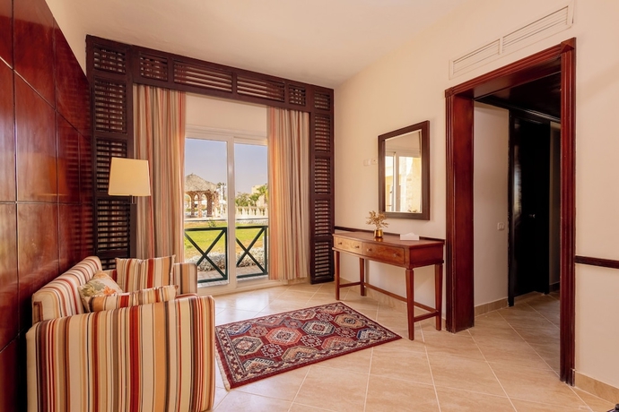 Imagen de la habitación del Hotel Dhara Residence Grand Waha. Foto 12