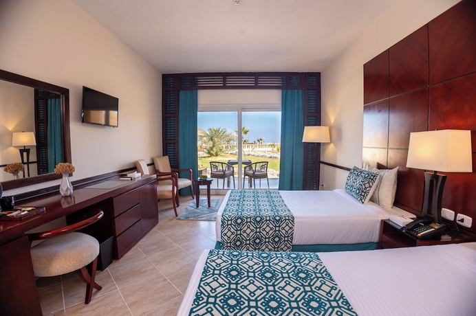 Imagen de la habitación del Hotel Dhara Residence Grand Waha. Foto 13