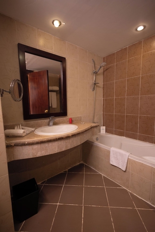 Imagen de la habitación del Hotel Dhara Residence Grand Waha. Foto 14
