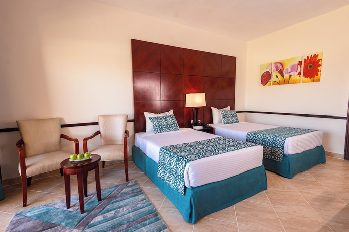 Imagen de la habitación del Hotel Dhara Residence Grand Waha. Foto 15