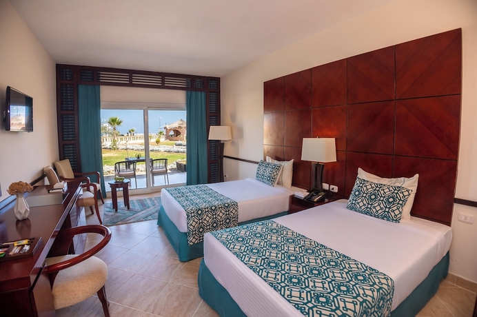 Imagen de la habitación del Hotel Dhara Residence Grand Waha. Foto 16