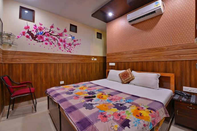 Imagen de la habitación del Hotel Dharam Villa. Foto 12