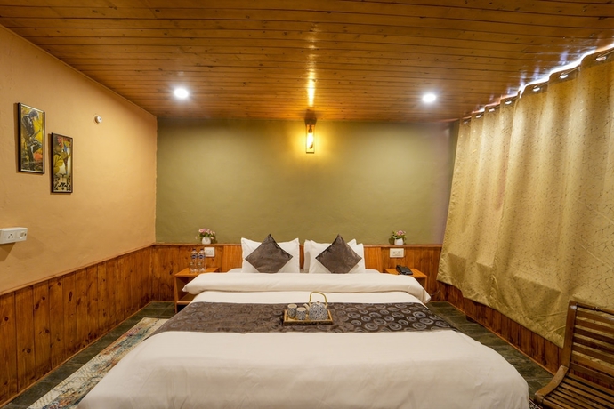 Imagen de la habitación del Hotel Dharamshala Village Resort. Foto 2