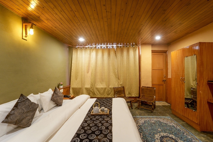 Imagen de la habitación del Hotel Dharamshala Village Resort. Foto 10