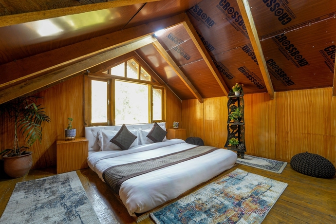 Imagen de la habitación del Hotel Dharamshala Village Resort. Foto 12